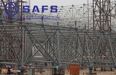 What is the difference between a tube truss and a grid structure?